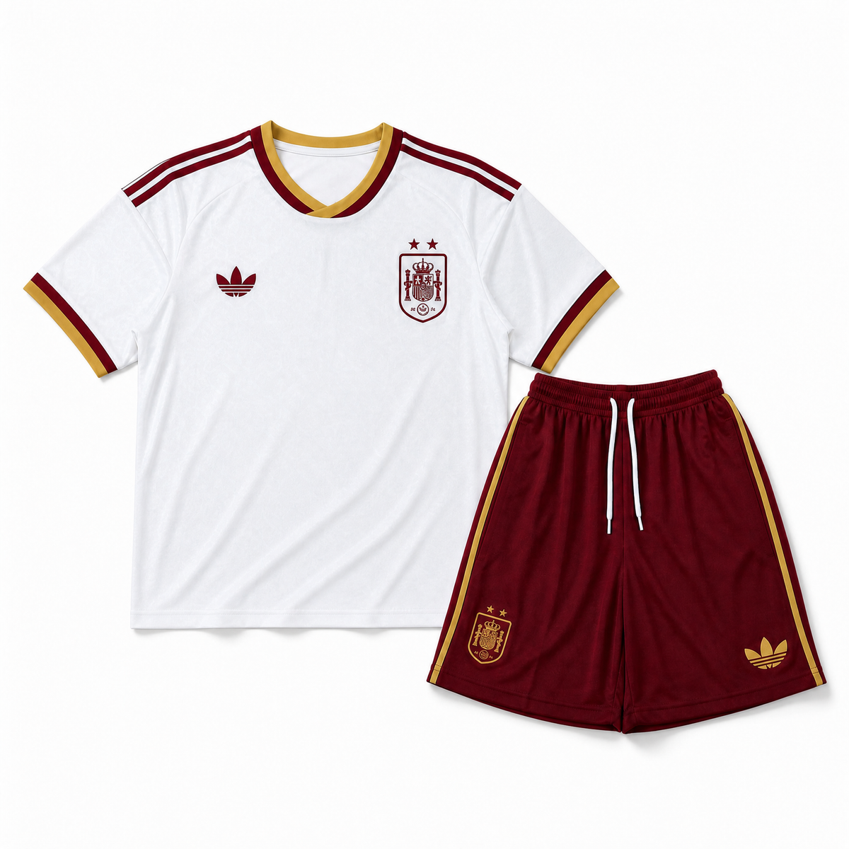Completo Away Bambino Spagna Mondiali 2026 con maglia bianca e pantaloncini bordeaux vista frontale.