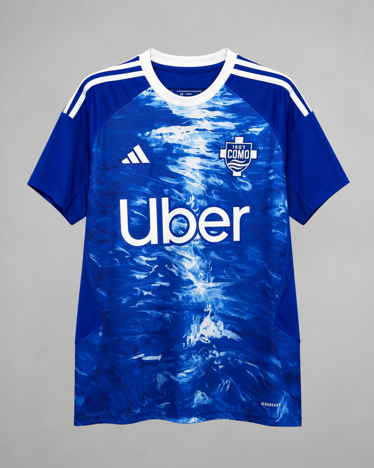 Como 1907 maglia home 2025/26 blu con grafica effetto lago
