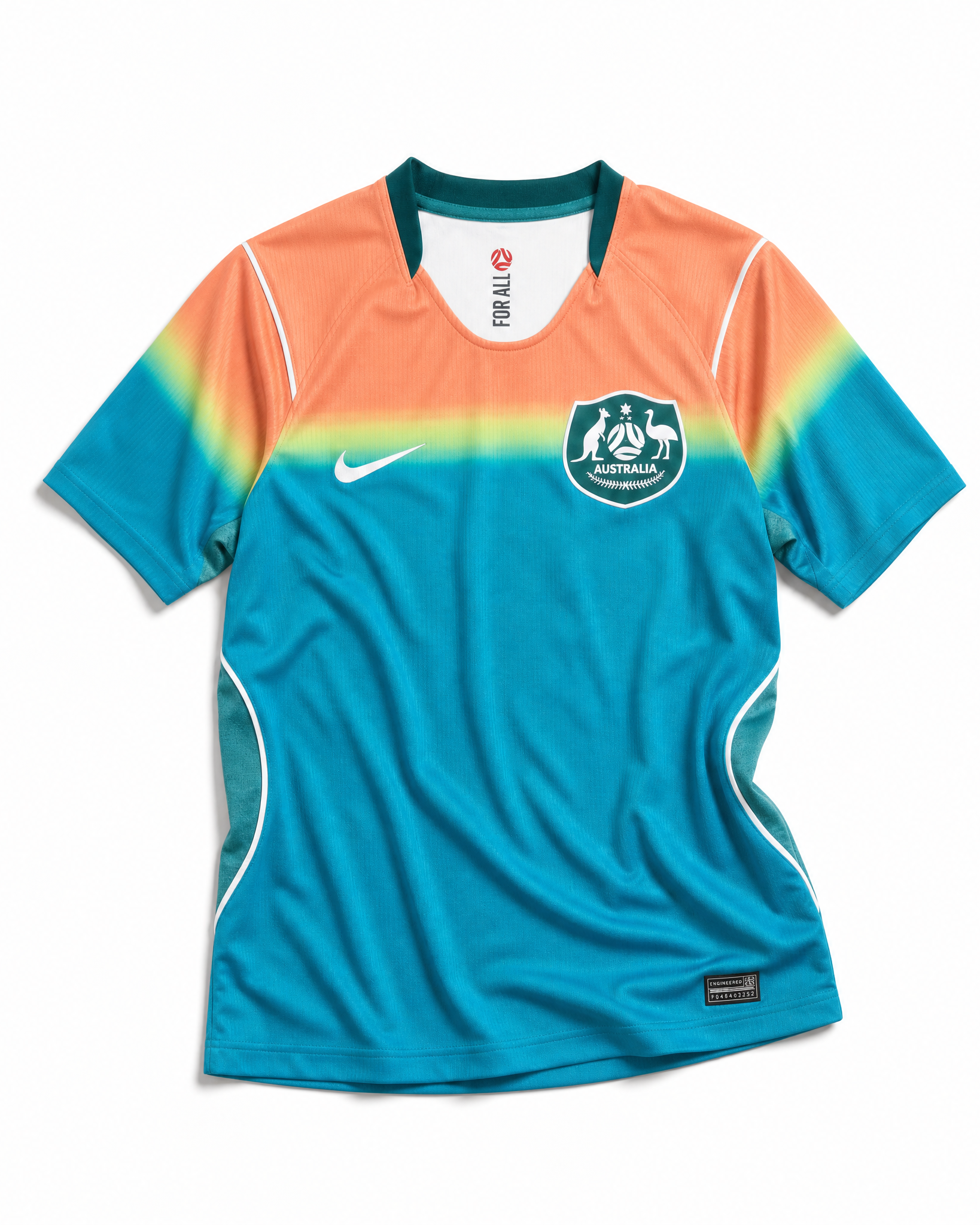 Fronte della maglia away dell'Australia 2026 turchese con spalle sfumate oro e arancione e stemma sul petto