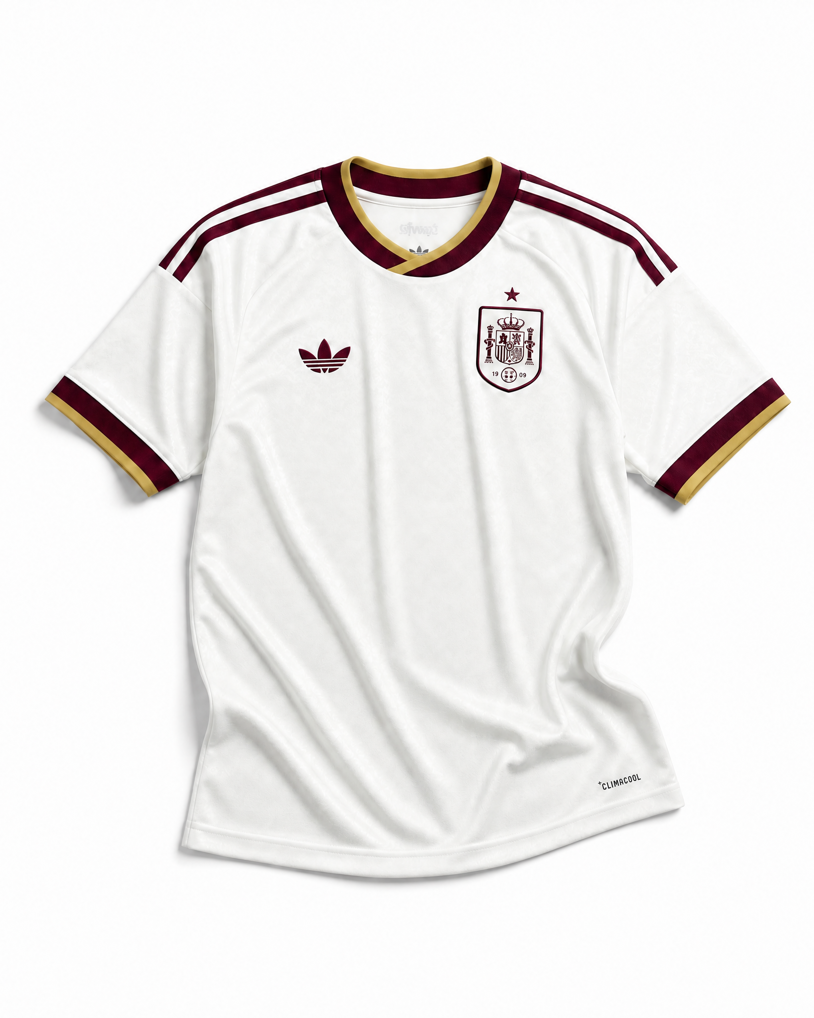 Fronte della maglia away della Spagna 2026 bianca con dettagli bicolore sul colletto e stemma centrale ricamato