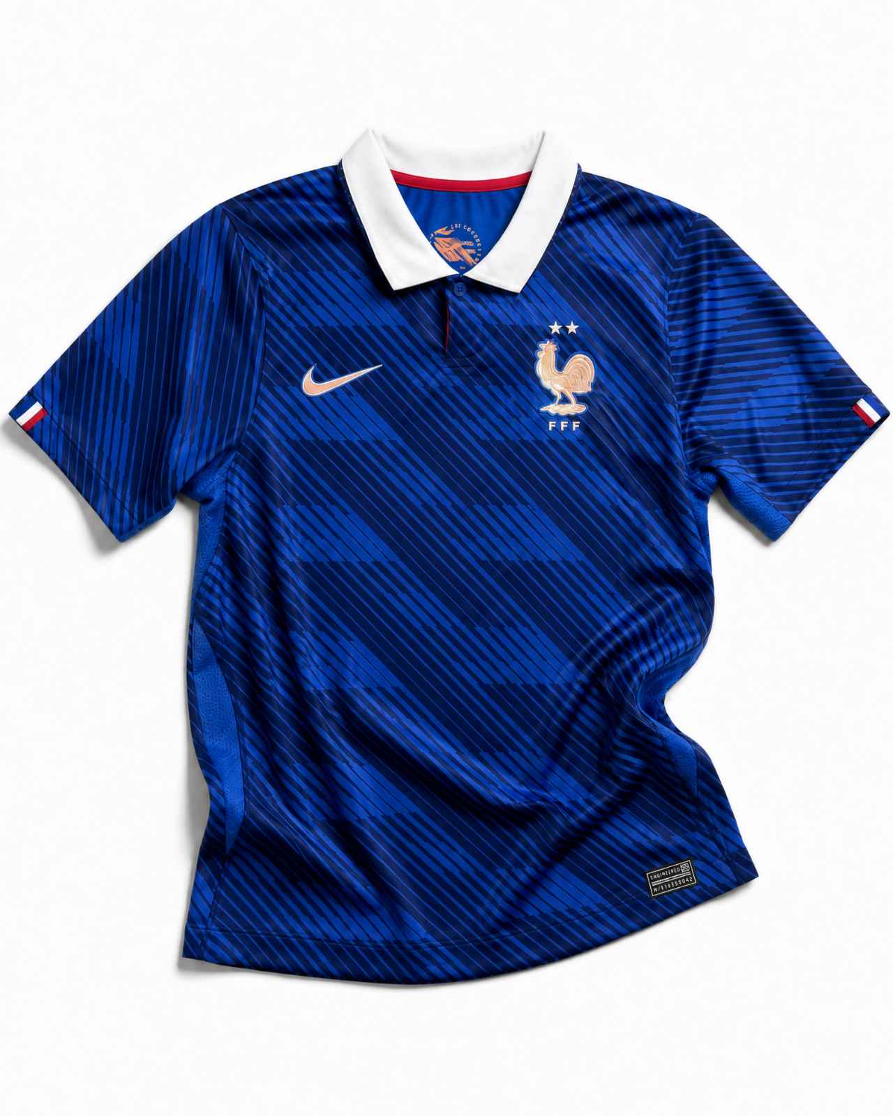 Fronte della maglia home della Francia 2026 blu con trama geometrica e stemma sul petto