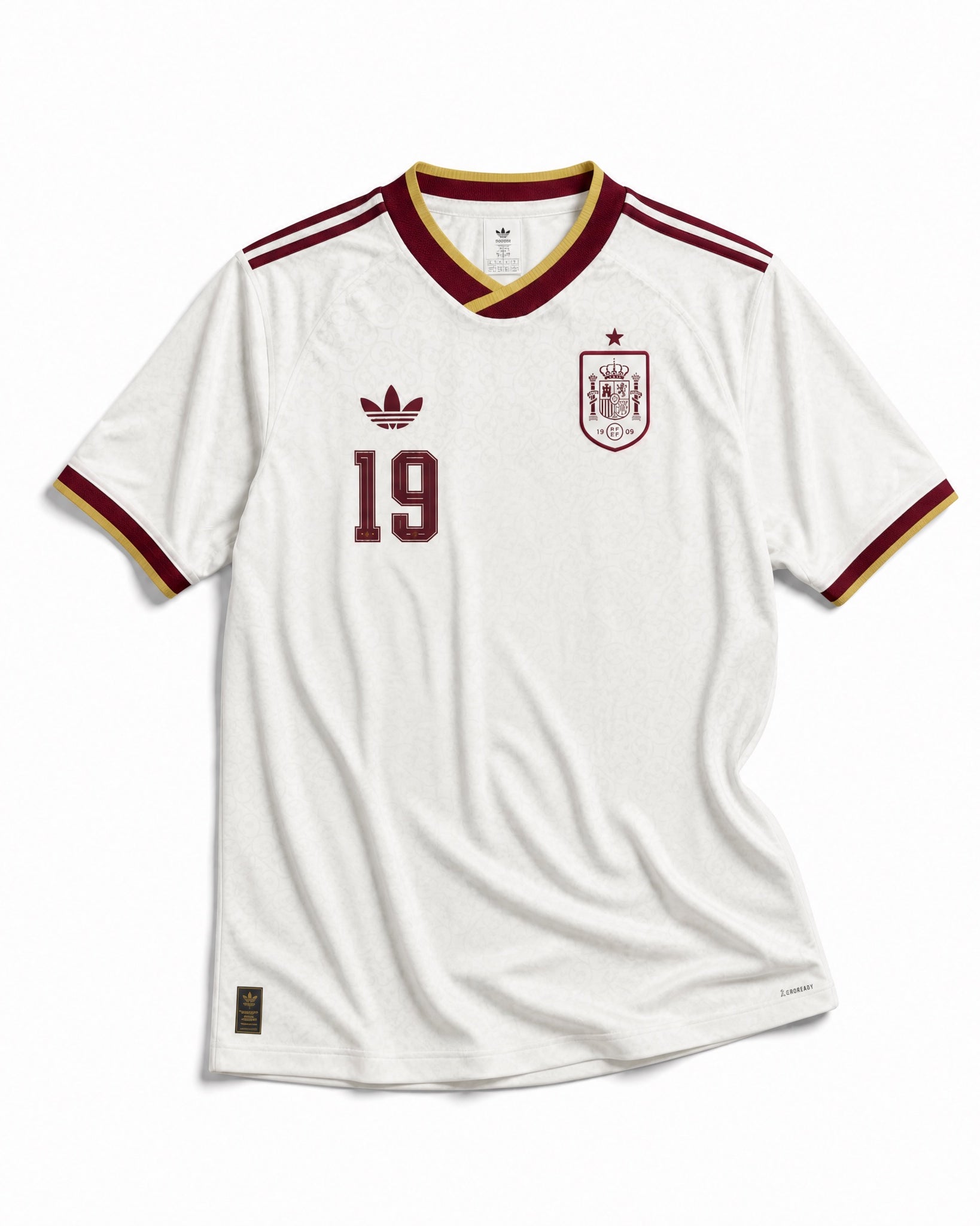 Maglia Lamine Yamal Spagna Away 2026 World Cup Winner vista frontale con design bianco e dettagli rossi, gialli e blu.