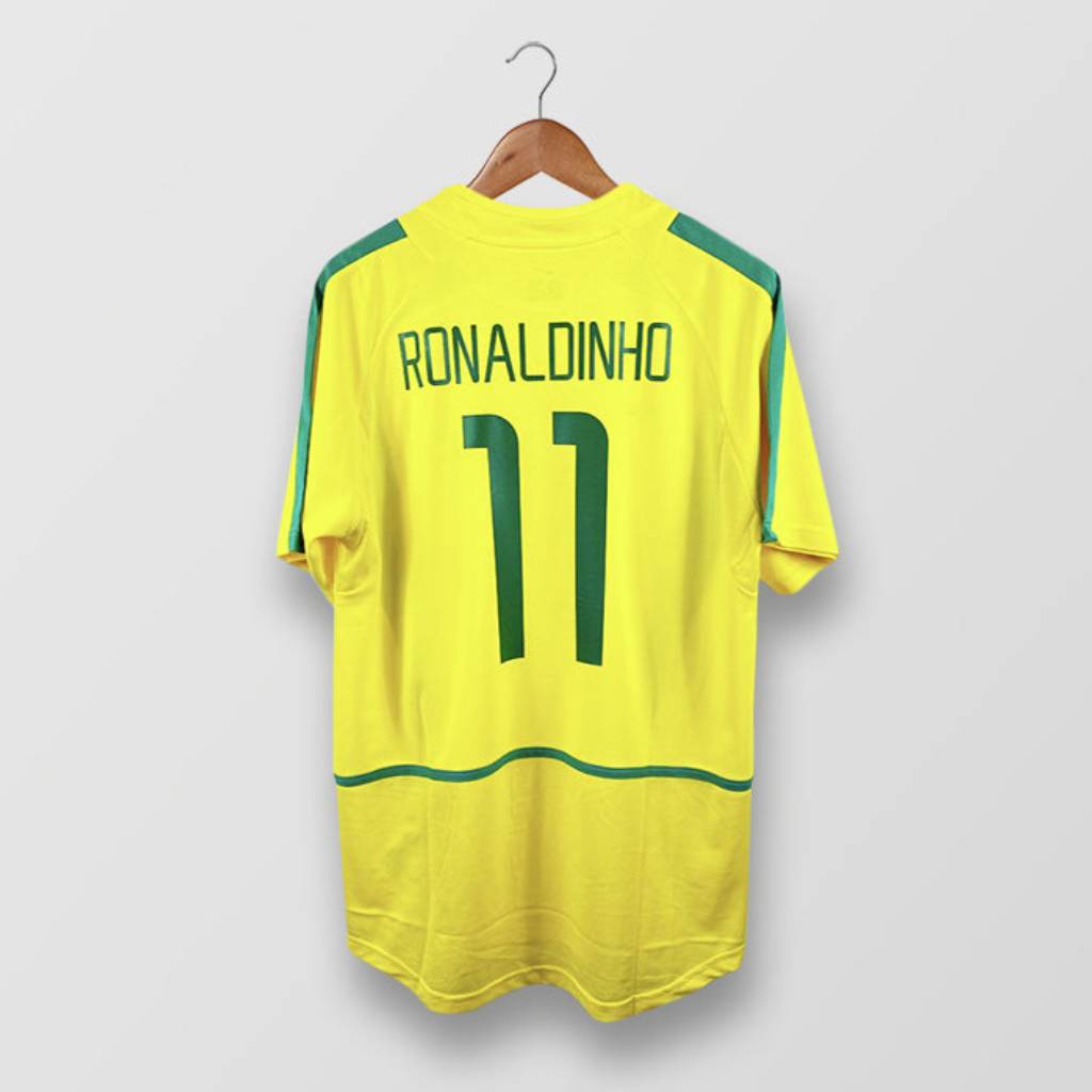 Maglia Brasile Home 2002 Ronaldinho numero 11 retro giallo con dettagli verdi
