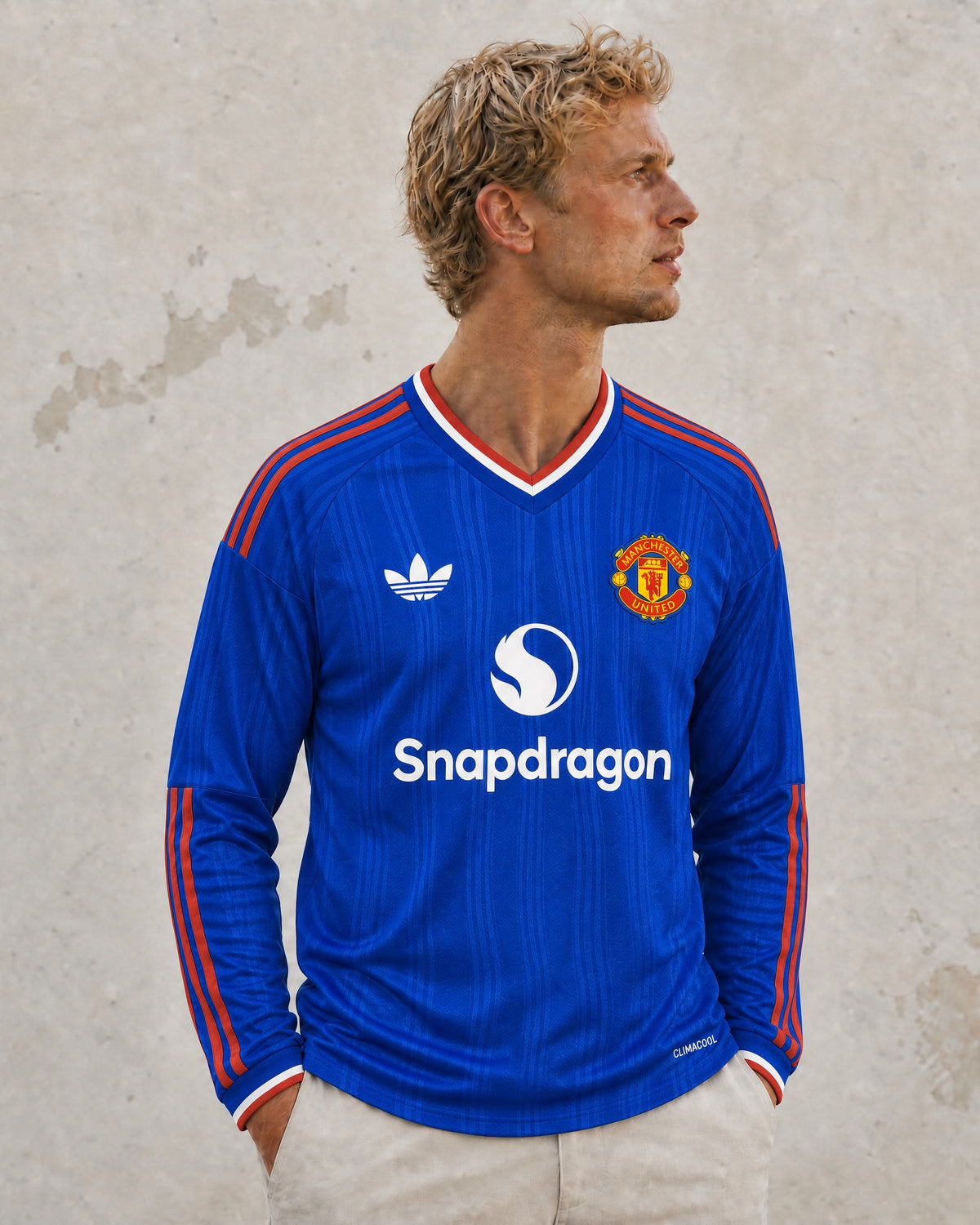 Dettaglio colletto e maniche maglia away Manchester United 2026/27