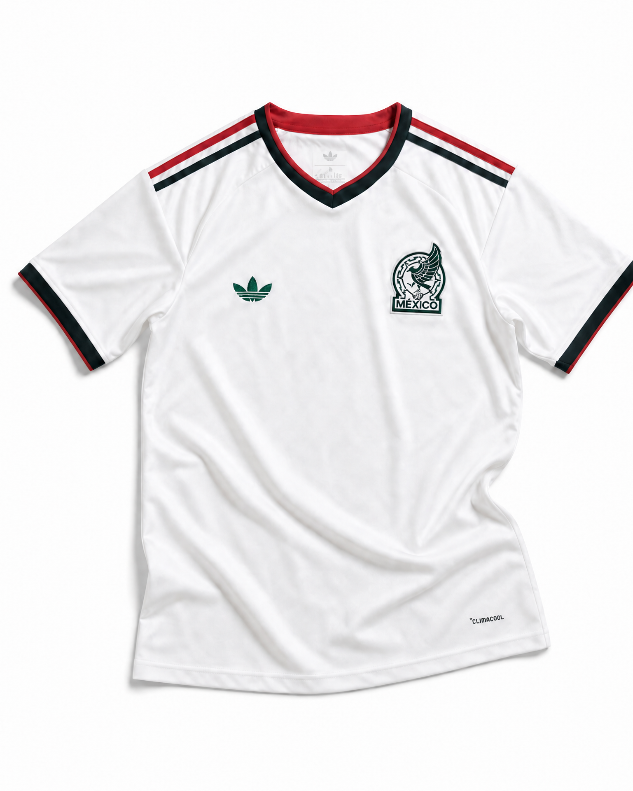 Maglia away Messico Coppa del Mondo 2026 — vista frontale, colore bianco con colletto a V in verde e rosso, stemma nazionale sul petto sinistro