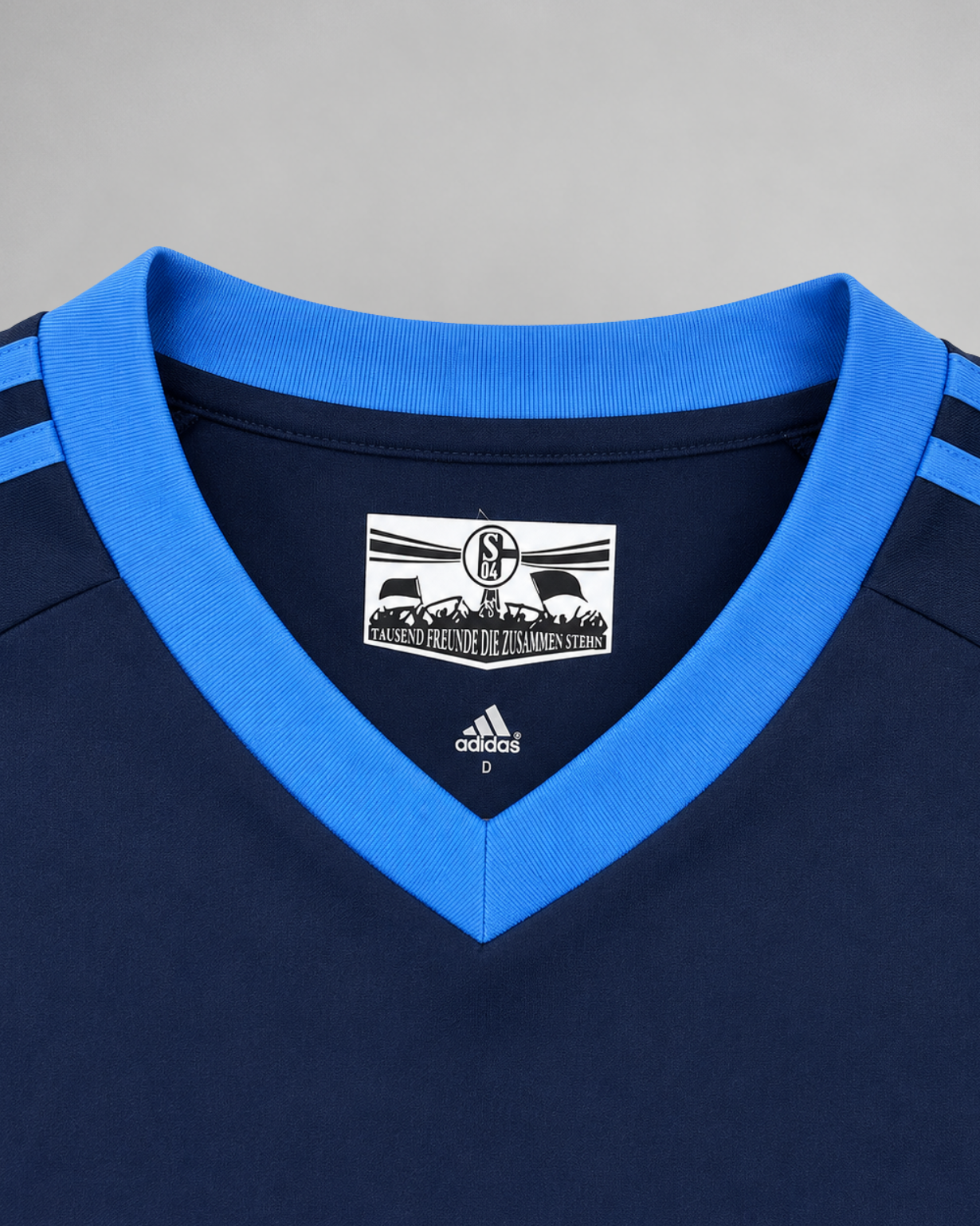 Dettaglio manica Schalke 04 maglia away 2010/11 stile retrò