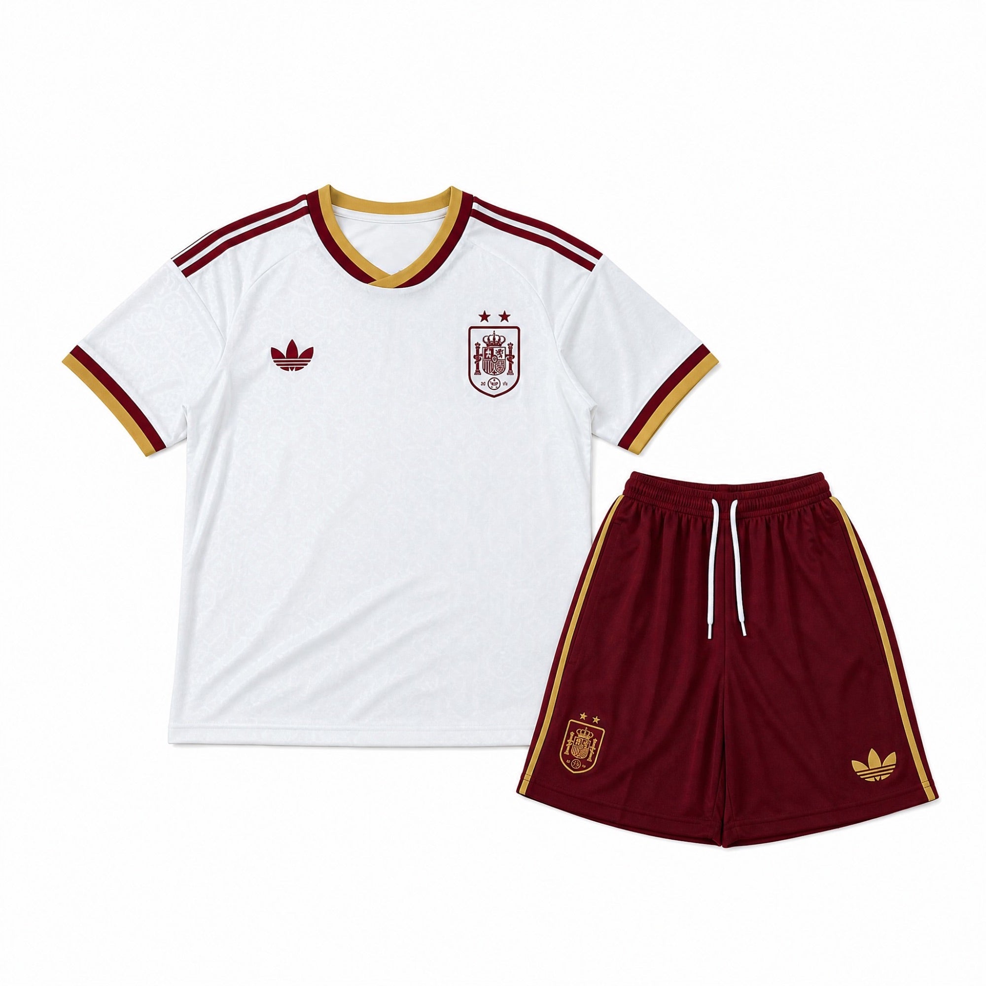 Completo Away Bambino Spagna Mondiali 2026 con maglia bianca e pantaloncini bordeaux vista frontale.