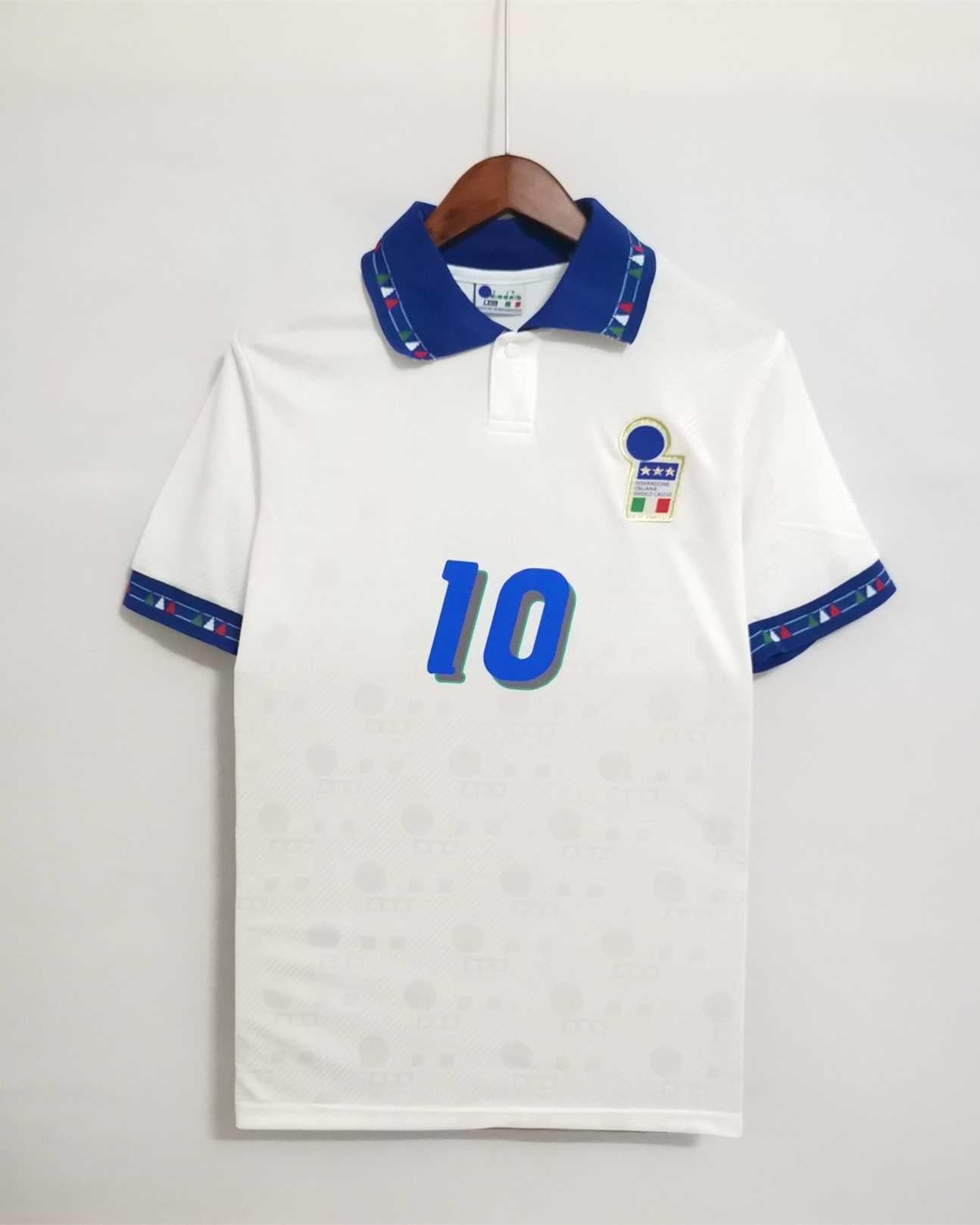 Fronte maglia away Italia 1994 con stemma FIGC e colletto tricolore.