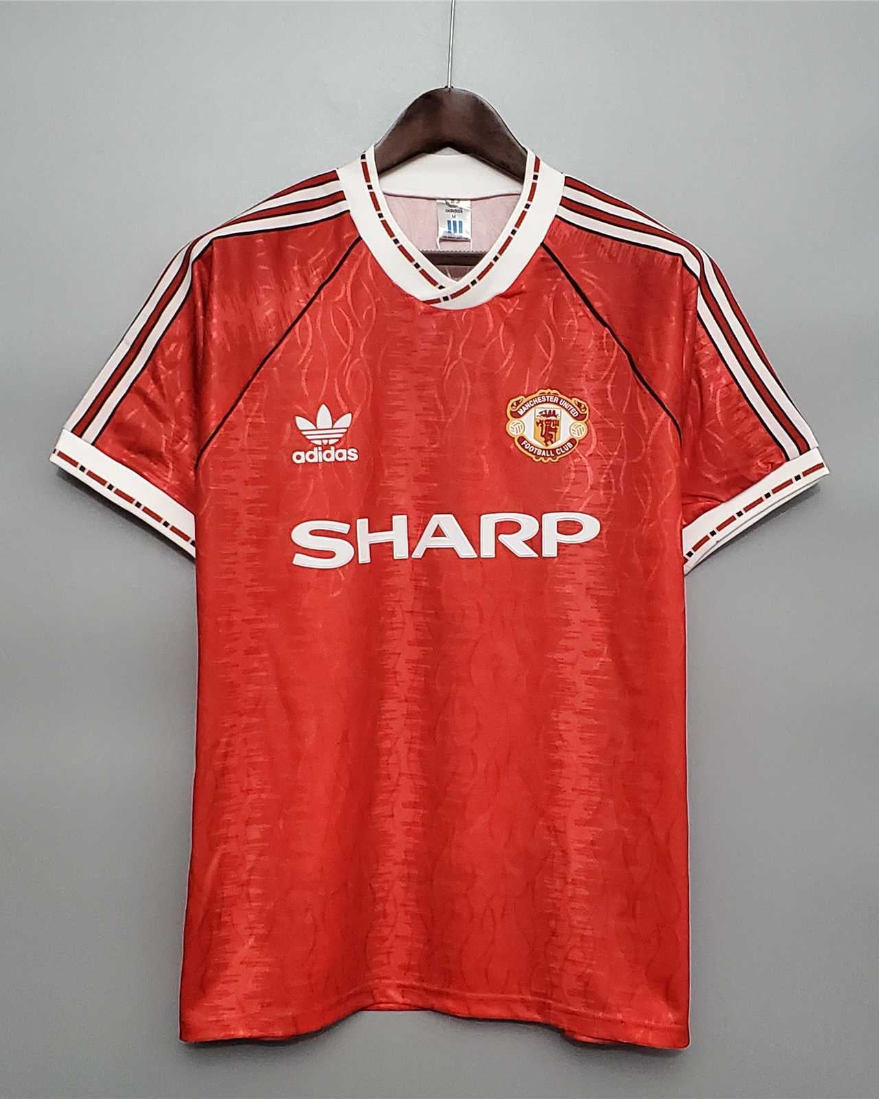 Maglia Manchester United 1991/92 home rossa pattern snowflake vista frontale sponsor Sharp