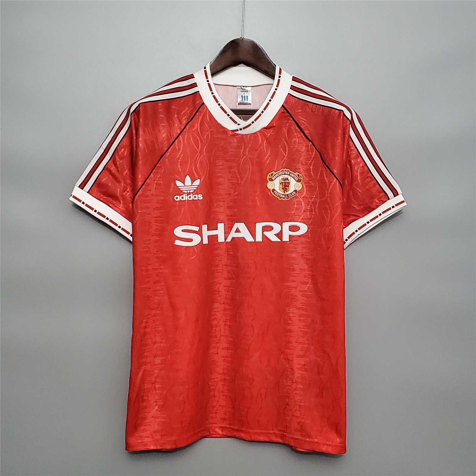 Maglia Manchester United 1991/92 home rossa pattern snowflake vista frontale sponsor Sharp