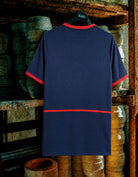 Maglia storica Arsenal away 2002/03 appesa dettaglio design originale