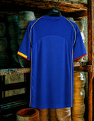 Maglia storica Arsenal away 2004/05 appesa dettaglio design originale