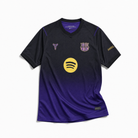 Maglia away Barcellona 2026/27 vista frontale colore scuro sfumato viola
