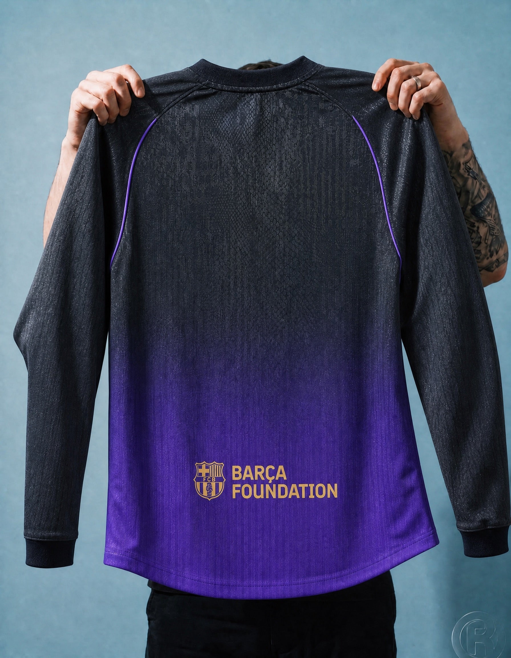 Maglia Barcellona 2026/27 away manica lunga vista posteriore dettaglio tessuto