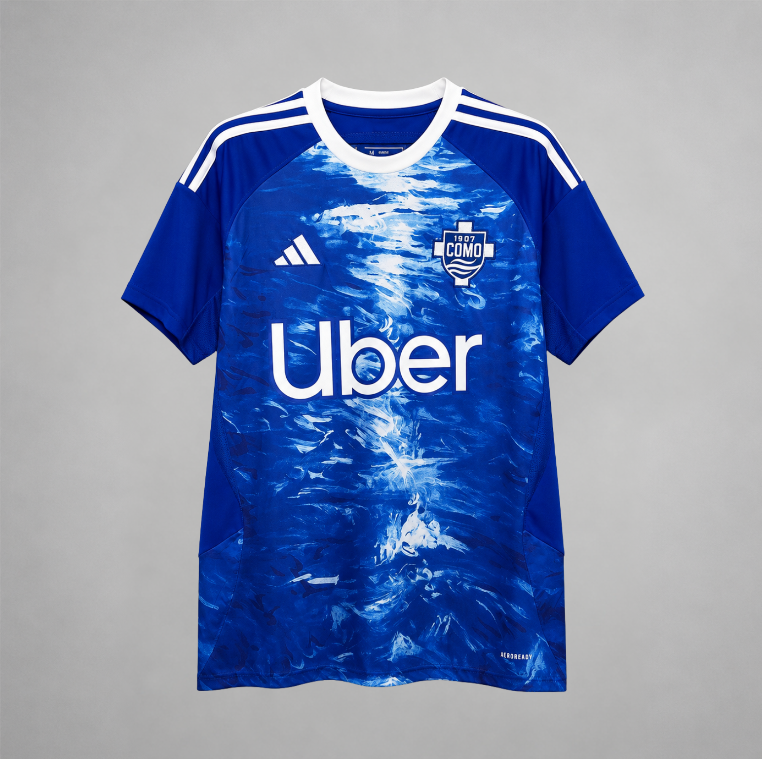 Como 1907 maglia home 2025/26 blu con grafica effetto lago