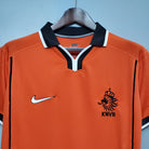 Dettaglio tessuto e logo maglia Olanda 1998