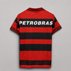 Retro della maglia Flamengo 1995/96 a bande orizzontali rosso nere
