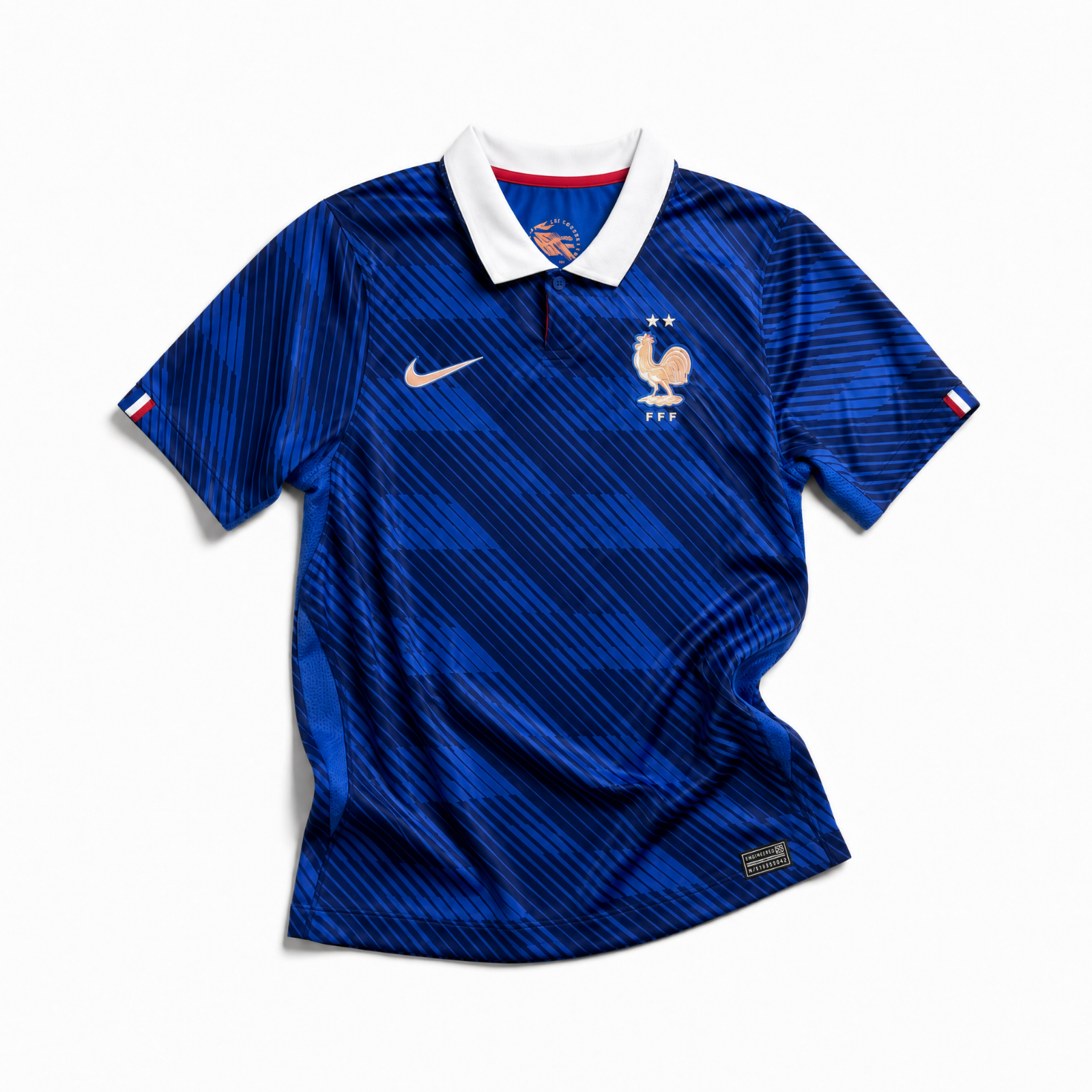 Fronte della maglia home della Francia 2026 blu con trama geometrica e stemma sul petto