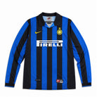Fronte kit home Inter 1998/99 strisce nerazzurre, colletto a polo e stella dorata.
