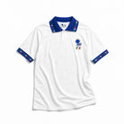 Fronte maglia away Italia 1994 con stemma FIGC e colletto tricolore.