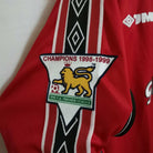 Logo Champions su maglia Manchester United 1998/99 dettaglio sponsor