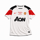 Maglia Manchester United Away 2010/11 vista frontale bianca con dettagli rossi e neri