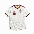 Maglia Lamine Yamal Spagna Away 2026 World Cup Winner vista frontale con design bianco e dettagli rossi, gialli e blu.