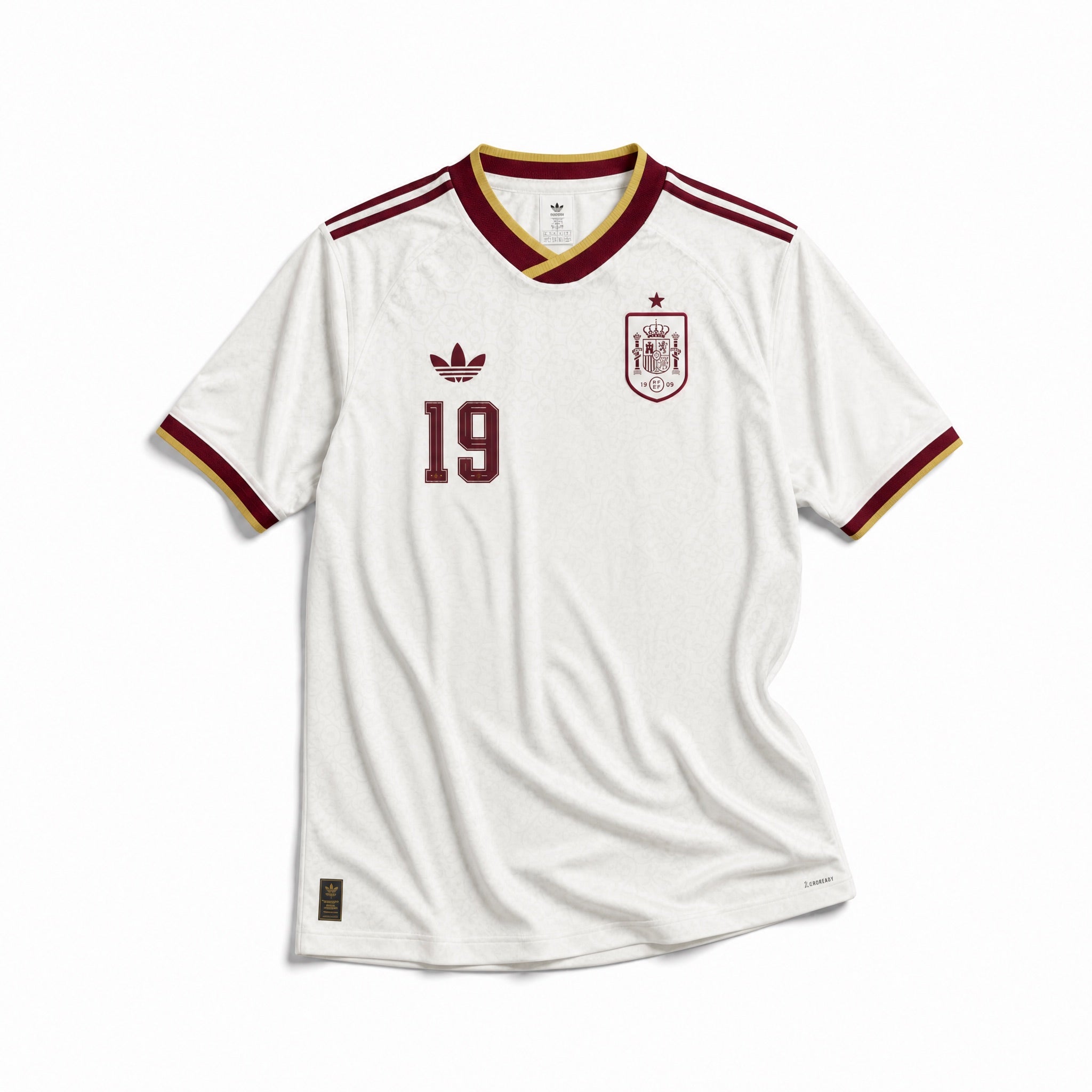 Maglia Lamine Yamal Spagna Away 2026 World Cup Winner vista frontale con design bianco e dettagli rossi, gialli e blu.