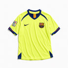 Maglia vintage Barcellona 2005/06 vista frontale colore giallo con dettagli blu rossi
