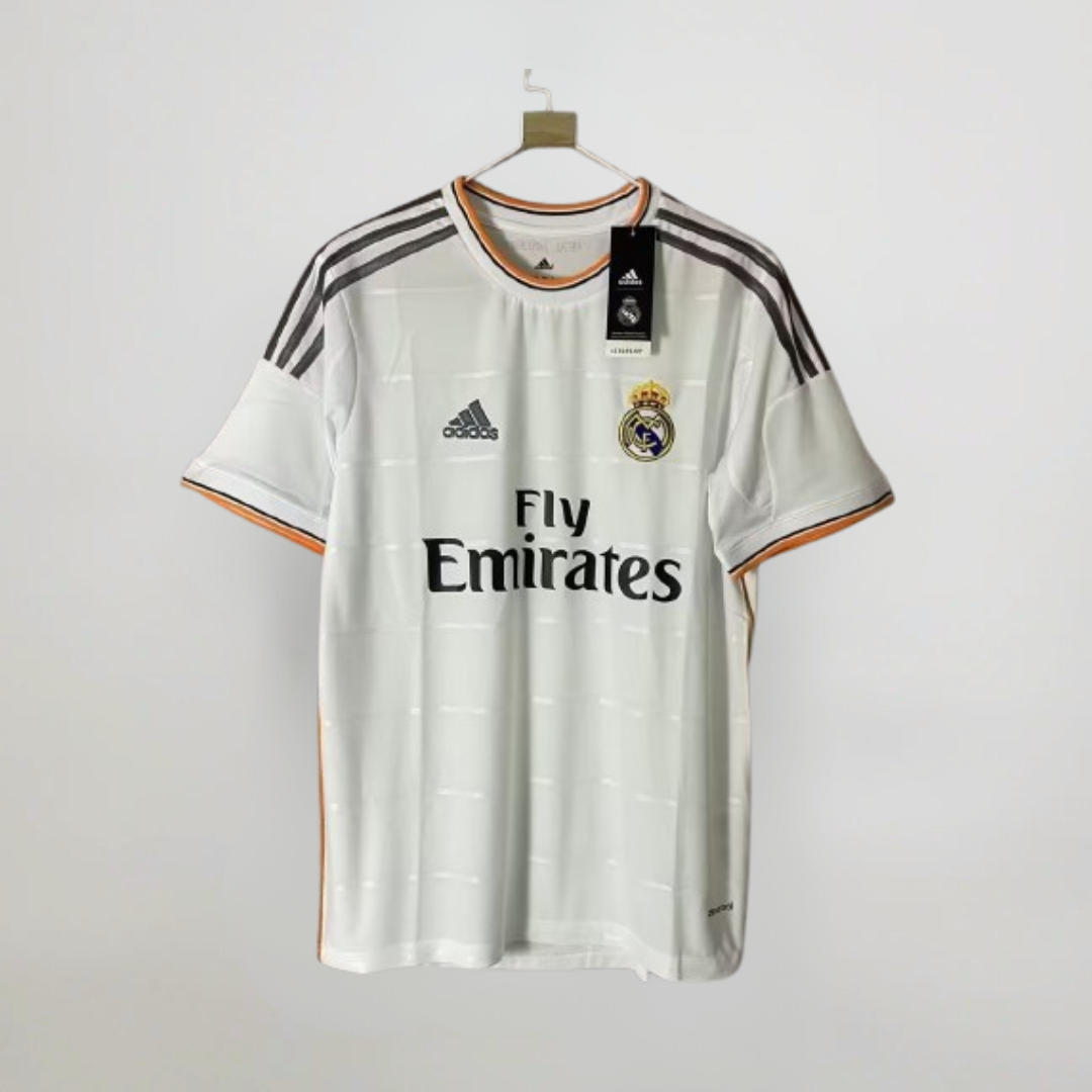 Maglia Real Madrid 2013/14 home bianca con dettagli arancioni vista frontale