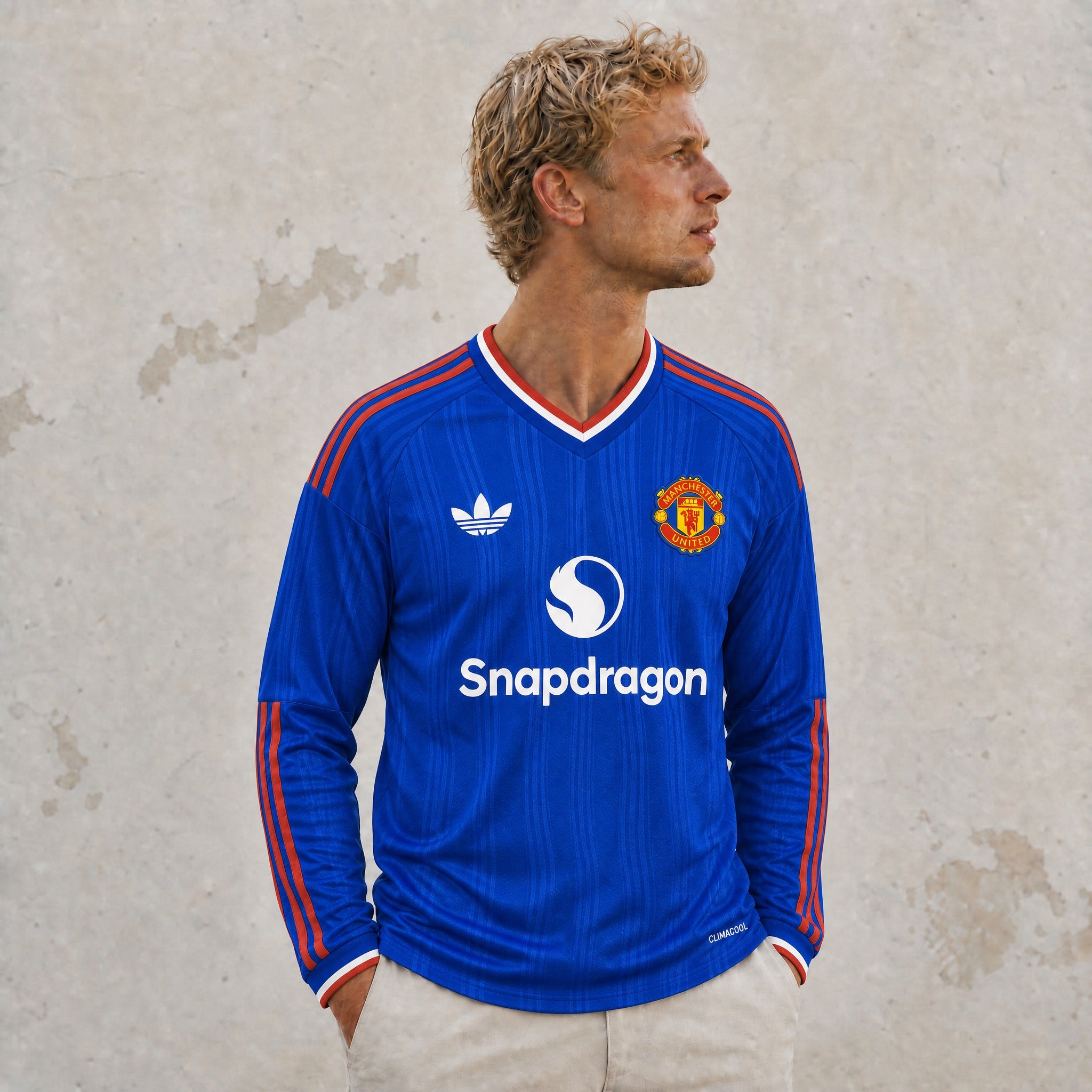 Dettaglio colletto e maniche maglia away Manchester United 2026/27