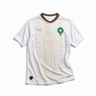 Maglia Away Marocco 2026 World Cup colore bianco con dettagli decorativi vista frontale.