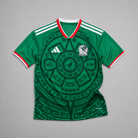 Mexico Maglia Home 2026 World Cup vista frontale verde con grafica circolare ispirata alla tradizione messicana