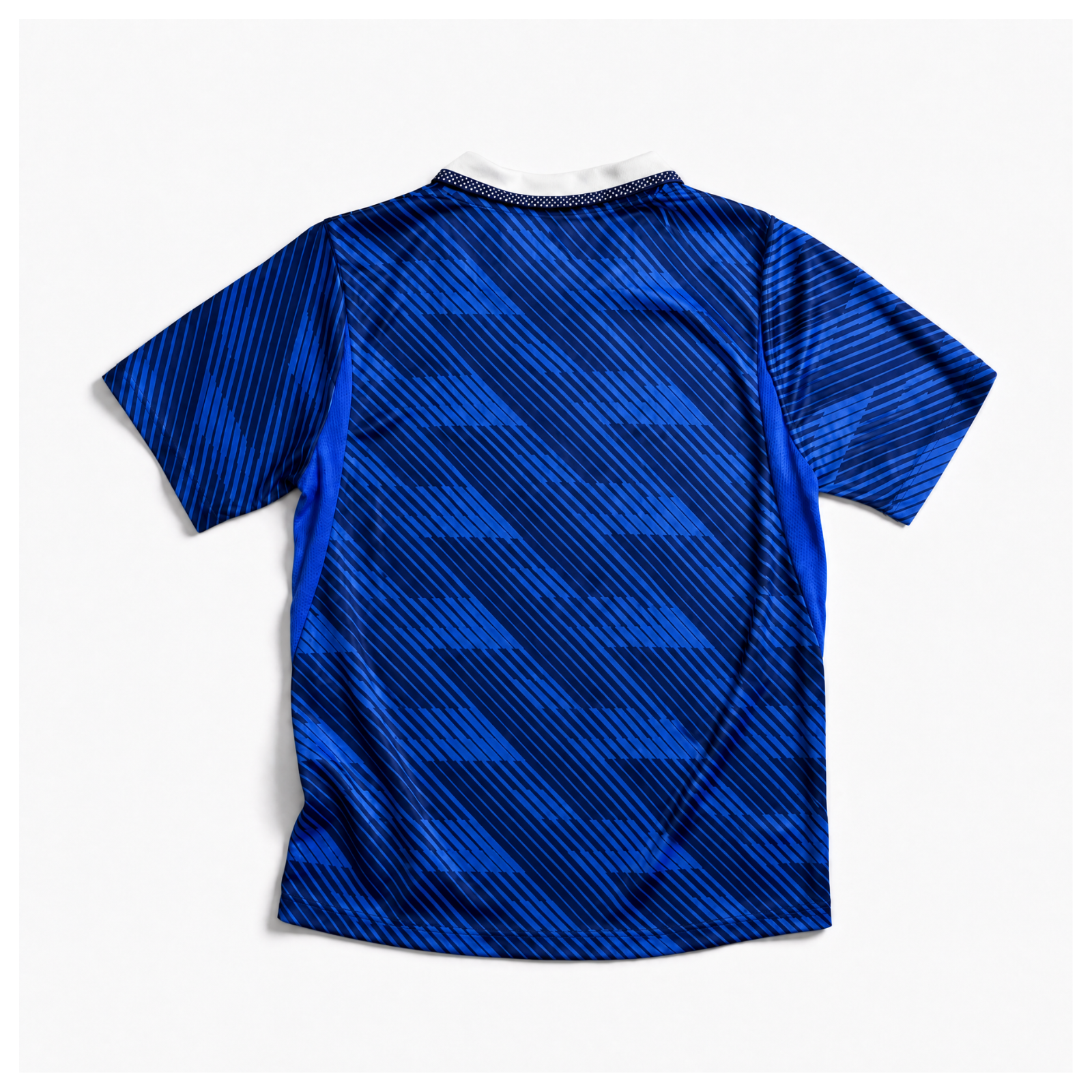 Retro della maglia blu della nazionale francese 2026 con motivo grafico a contrasto

