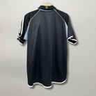 Vista frontale maglia Newcastle United away 2000/01 con colletto classico e logo Adidas