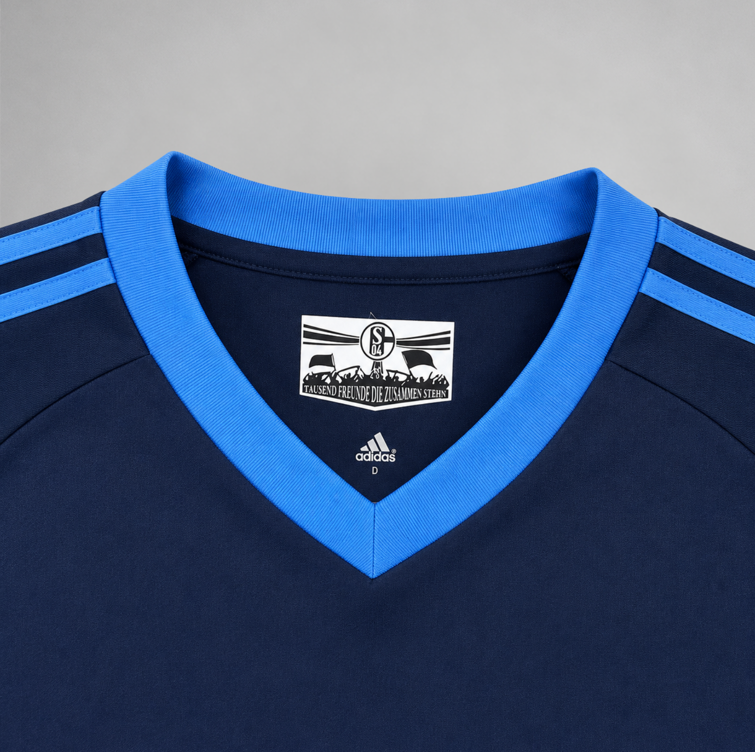 Dettaglio manica Schalke 04 maglia away 2010/11 stile retrò
