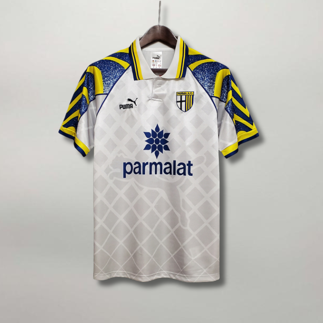 Vista frontale maglia Parma 1995/96 away con pattern geometrico anni 90
