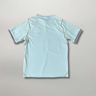 Vista posteriore della maglia da trasferta francese 2026 con dettaglio tricolore sui bordi