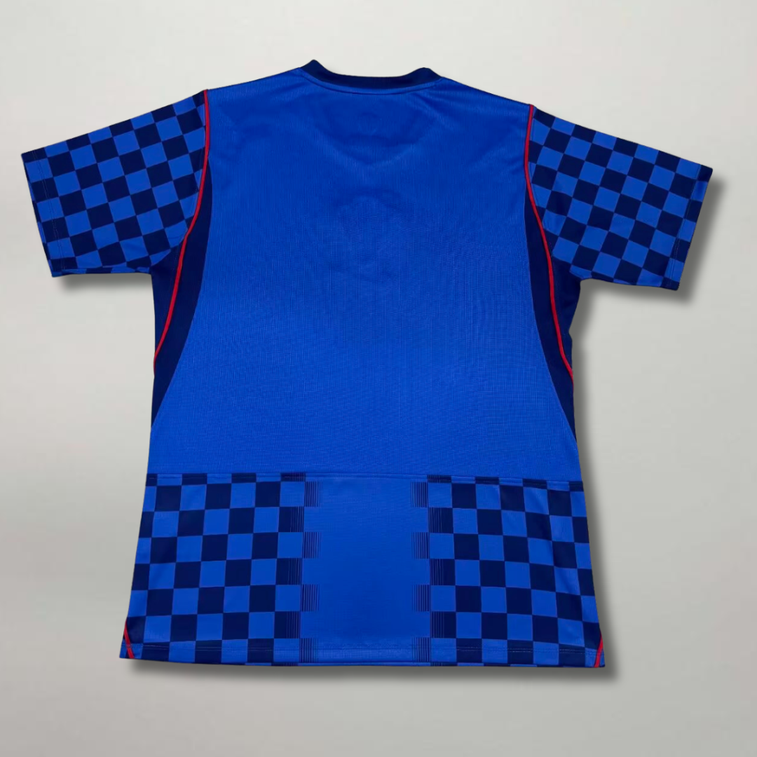 Vista posteriore della seconda divisa croata 2026 blu con trame geometriche all-over e tessuto traspirante