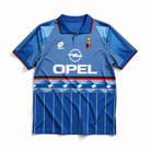 kit vintage blu Milan 1995/96 con colletto a polo e trame verticali.