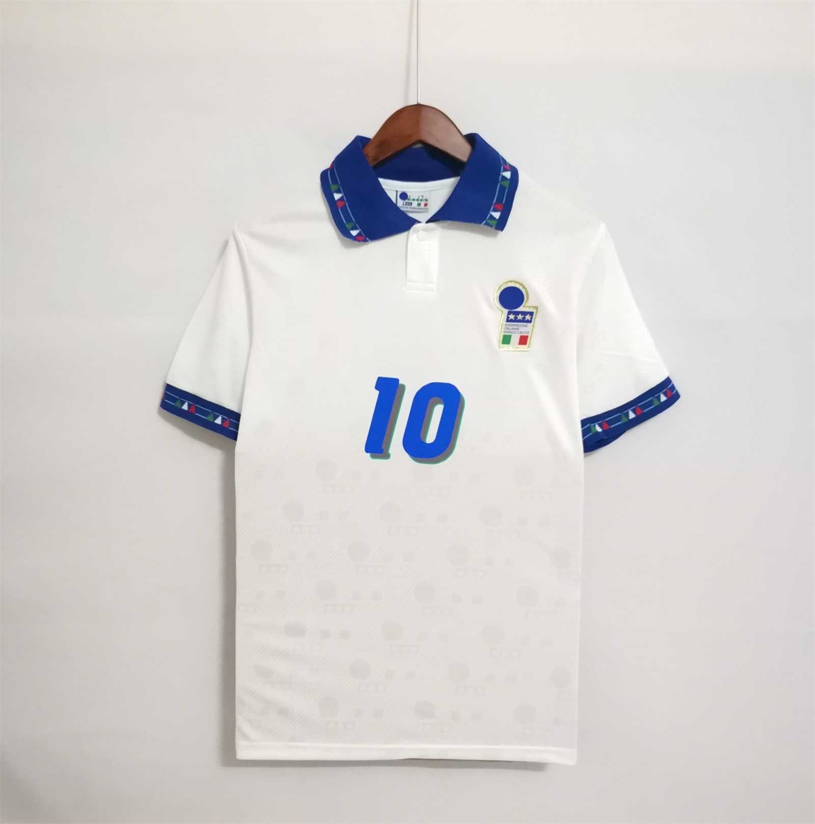 Fronte maglia away Italia 1994 con stemma FIGC e colletto tricolore.