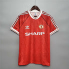 Maglia Manchester United 1991/92 home rossa pattern snowflake vista frontale sponsor Sharp